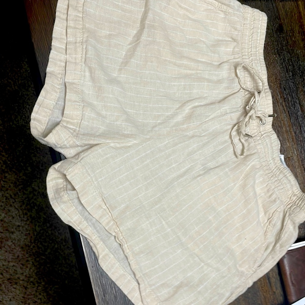 Tan shirt with white stripes